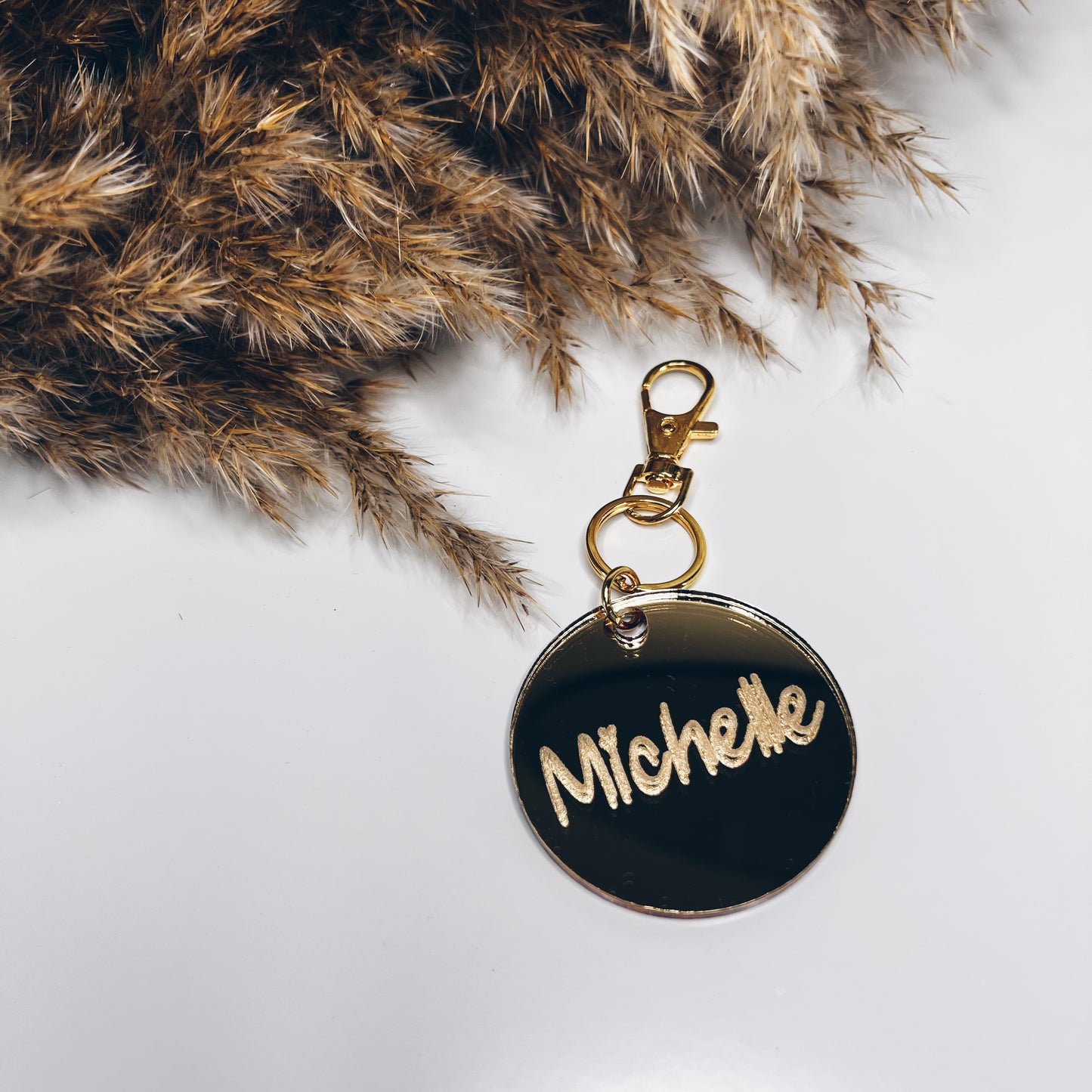 Goudspiegel sleutelhanger met naam - rond