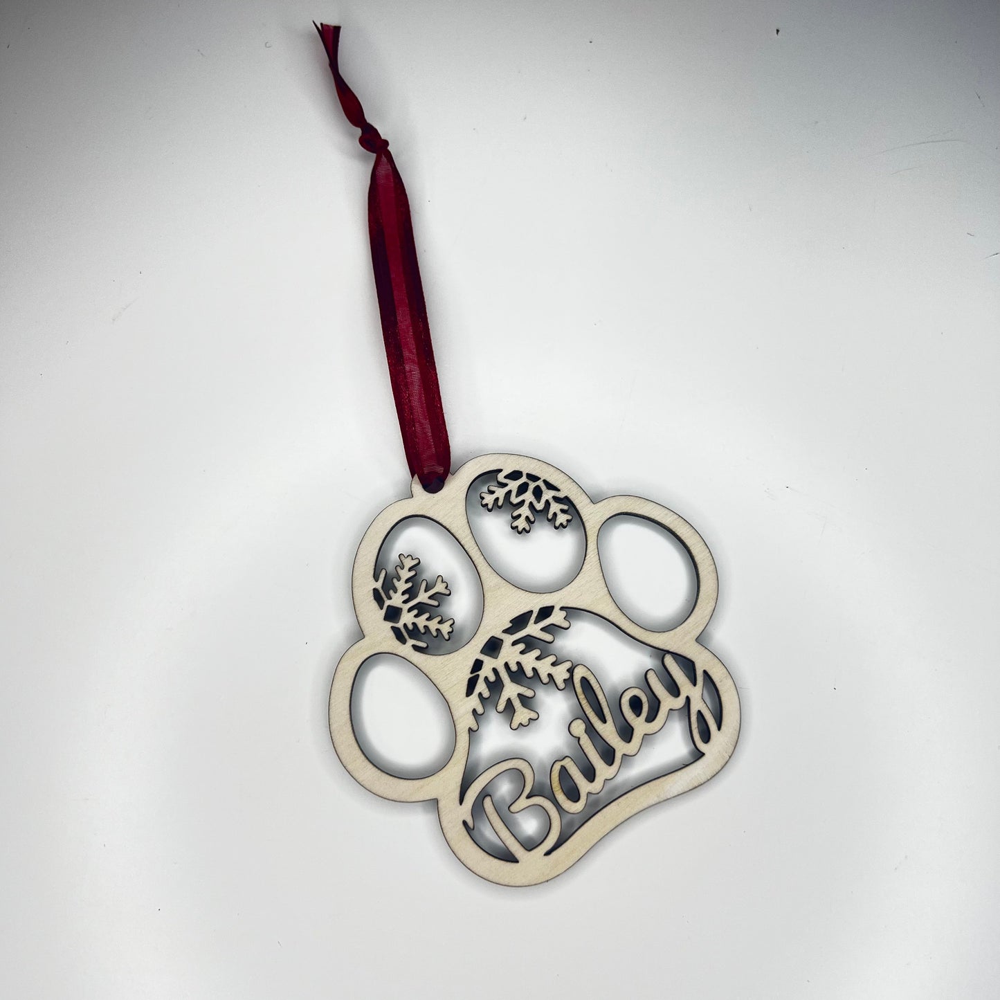Houten kerst ornament met naam - snow paw